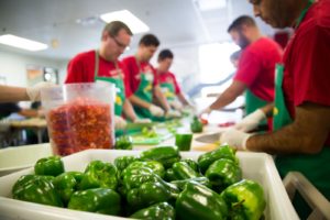 Open Arms Volunteers Chopping Peppers | Food As Medicine | Calbone.com